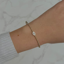 14K GOLD DIAMOND FLEXIBLE EYE BANGLE