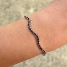 14K GOLD BLUE SAPPHIRE WAVE TENNIS BRACELET