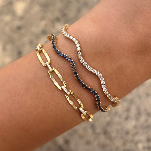 14K GOLD BLUE SAPPHIRE WAVE TENNIS BRACELET